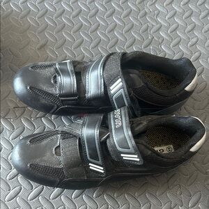 Black Athletic Cycling Shoes with Velcro Straps and Aerodynamic Design
